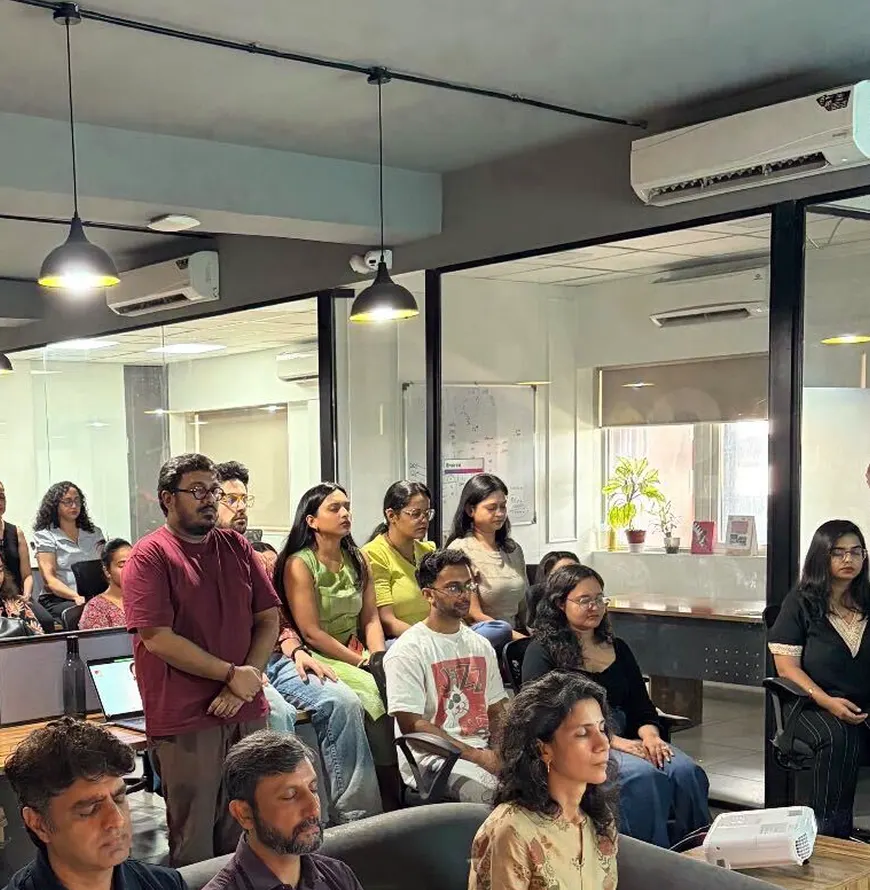 The team gathered in the office for a wellness session